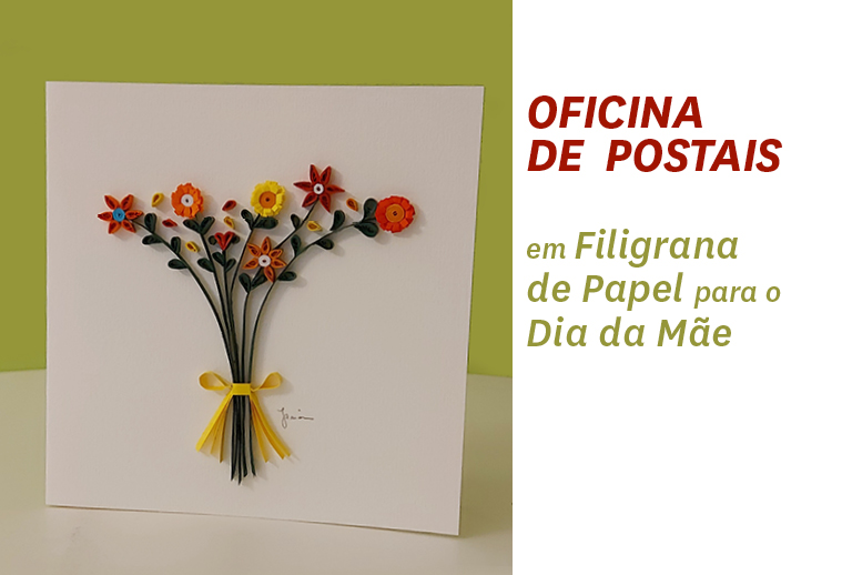 Fotografia de uma ramo de flores feitas em filigrana de papel.